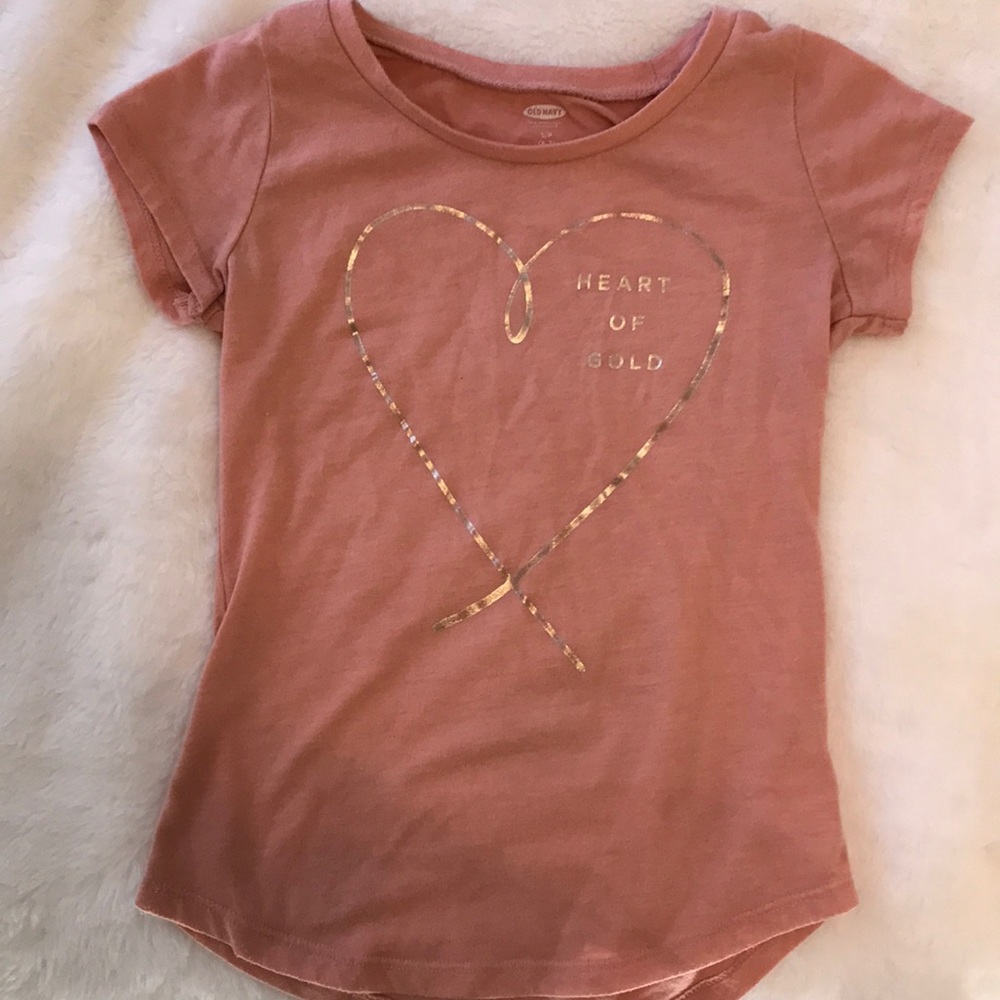 Peach top with gold words